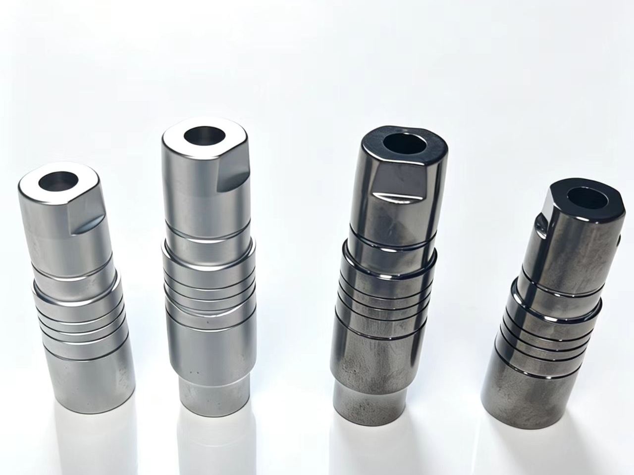 Zinc alloy aviation connector housing with an electroplated shell and machined pin bores