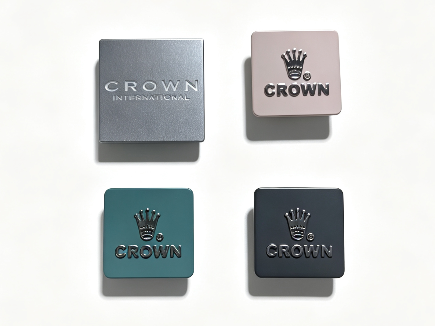 Two-tone zinc alloy bag nameplate with a plated logo on a powder coated field